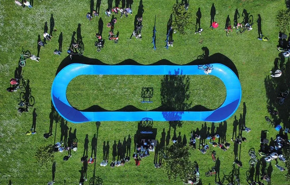 Riders enjoying a modular pump track